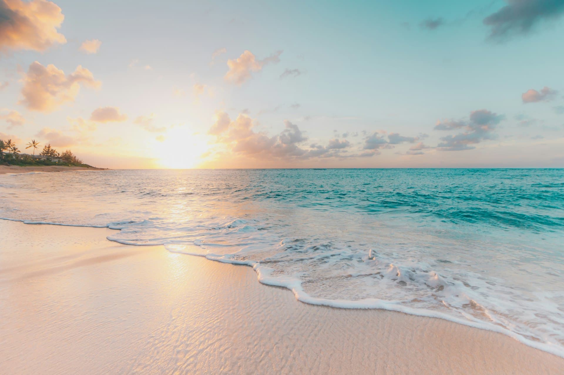Tropical beach at sunset with turquoise water